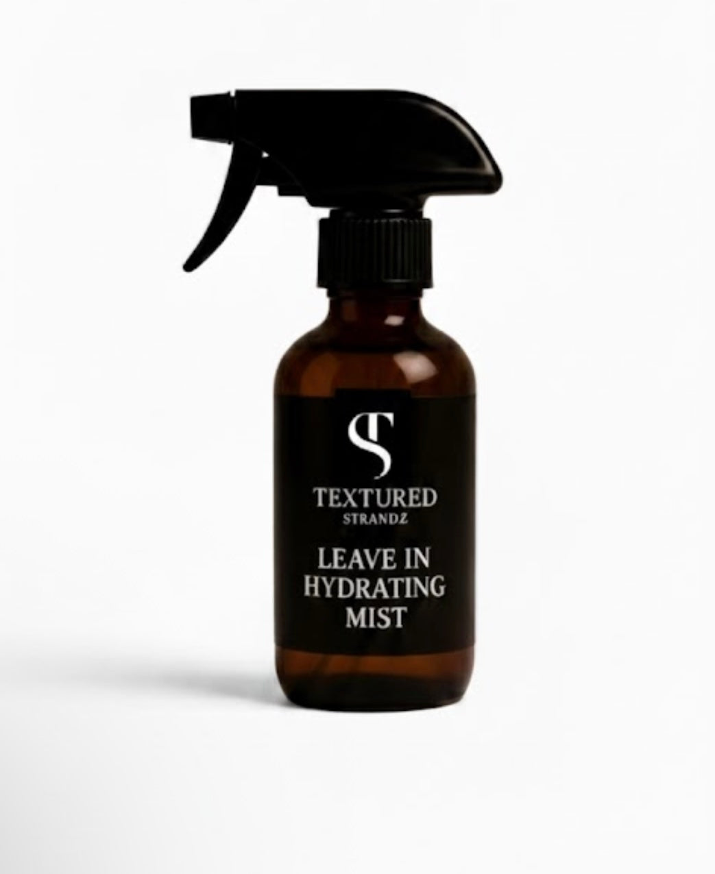 Brown spray bottle with black label on a white background